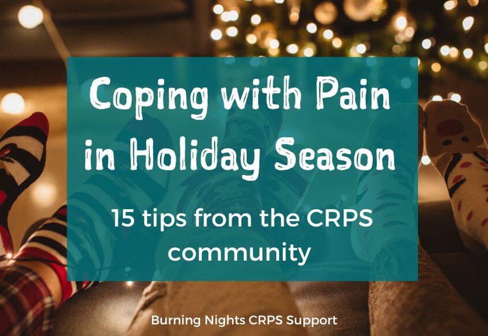 Coping with pain in holiday season - 15 tips from the CRPS community. By Burning Nights CRPS Support. Text over a photograph of friends with Christmas socks on relaxing in front of a lit-up Christmas tree.